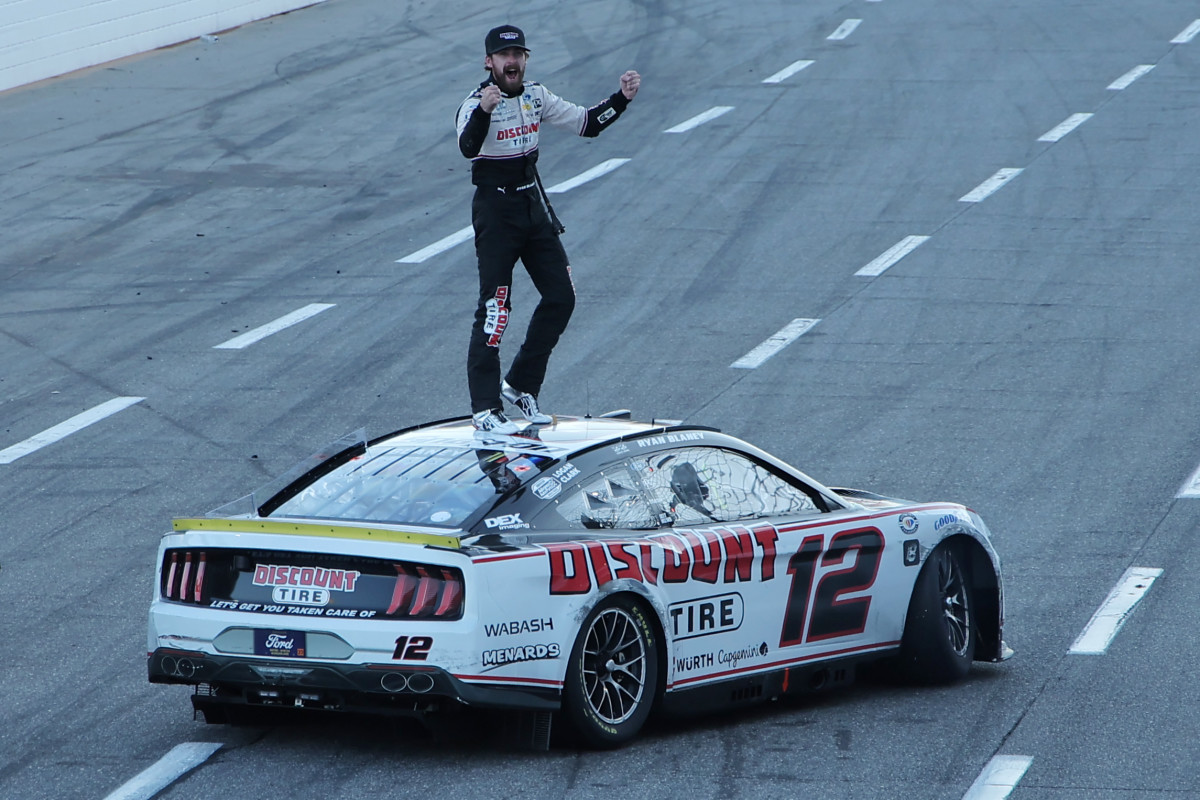 Now that's how you do it! Ryan Blaney celebrates in front of the sellout crowd Sunday at Martinsville Speedway. (Photo by Jonathan Bachman/Getty Images)